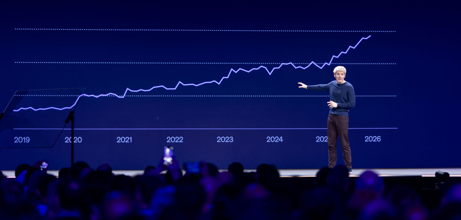 Patrick Collison explaining chart in keynote on stage
